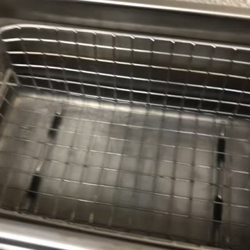 Cleaning an iPhone logic board