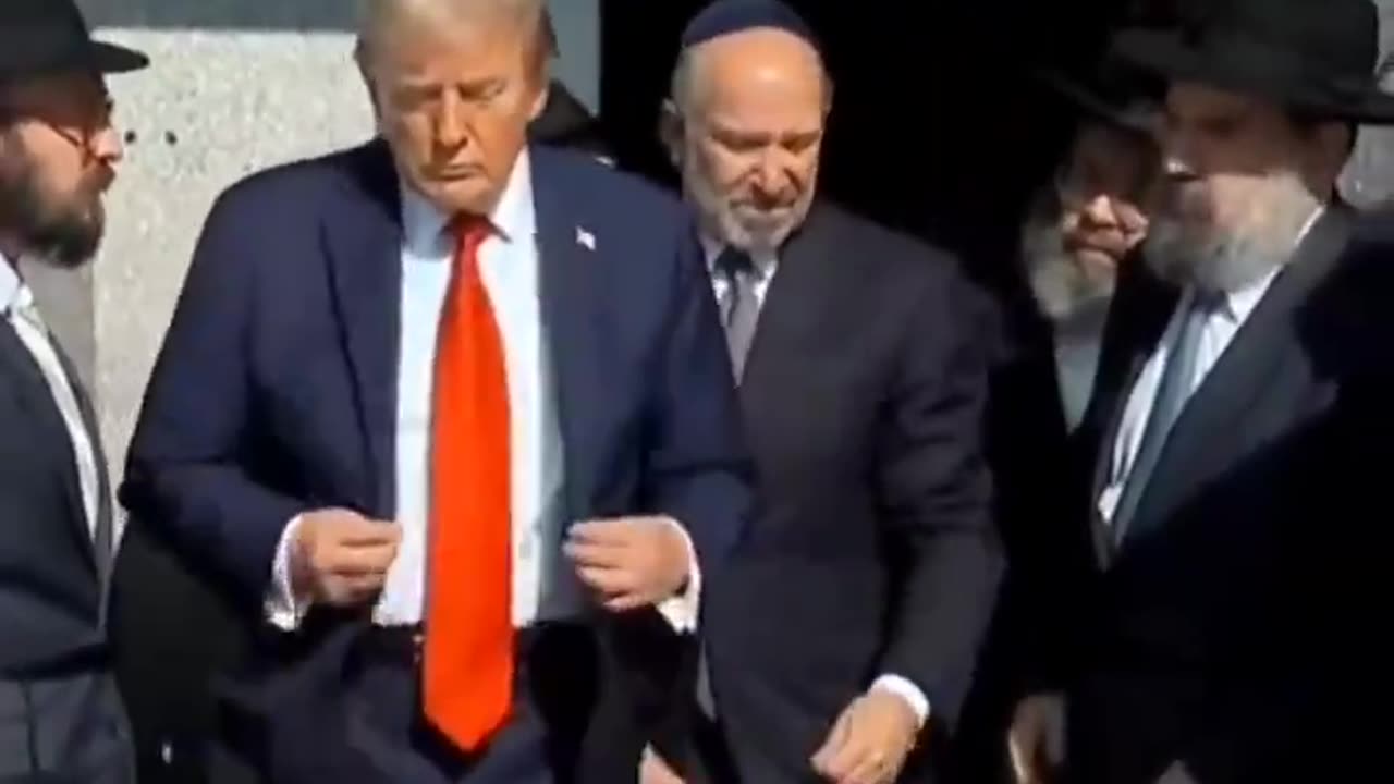 Trump prays at the tomb of Lubavitcher Rebbe Menachem Mendel Schneerson in Queens, New York.