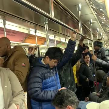 Guys sing and clap we will rock you by queen on subway train