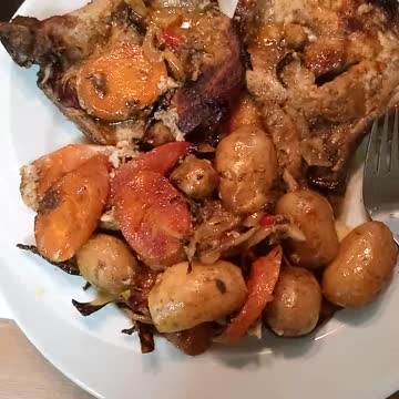 Porkchop with roast potatoes and carrots