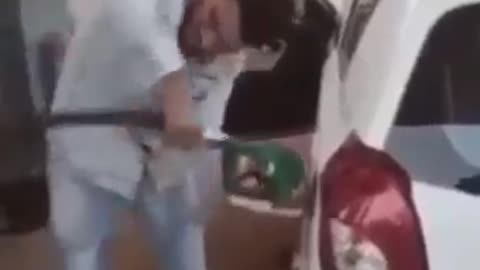 Funny man buying gas