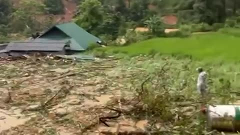 A bridge collapsed into a river, sending vehicles plunging below, as Vietnam faces