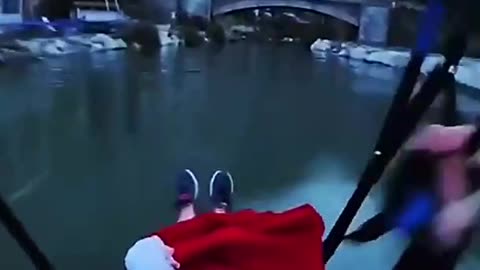 Cross the bridge hole with a parachute