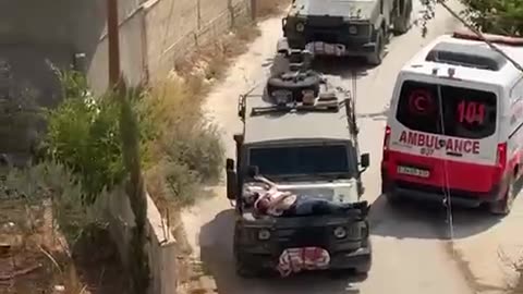 Israeli border police using a wounded terrorist as human shield against RPG