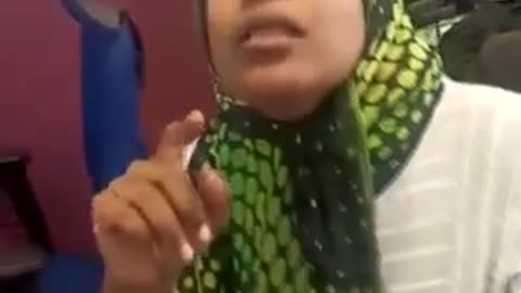 A woman has been arrested after screaming “I am here to kill the God of the