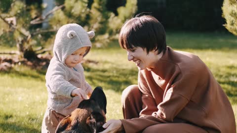 Mom with a Baby and a Dog