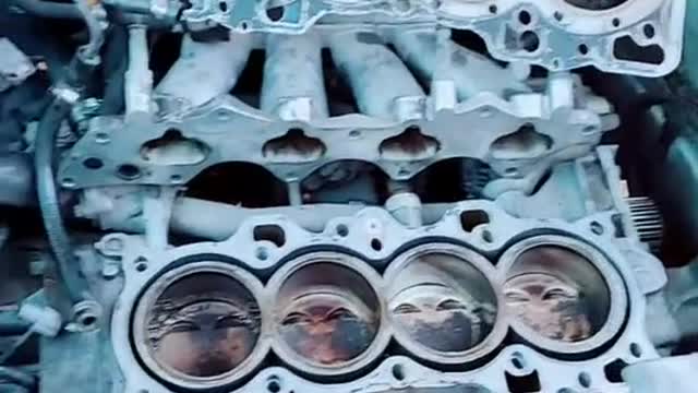 The repairman was confronted with a jumble of configurations inside the engine