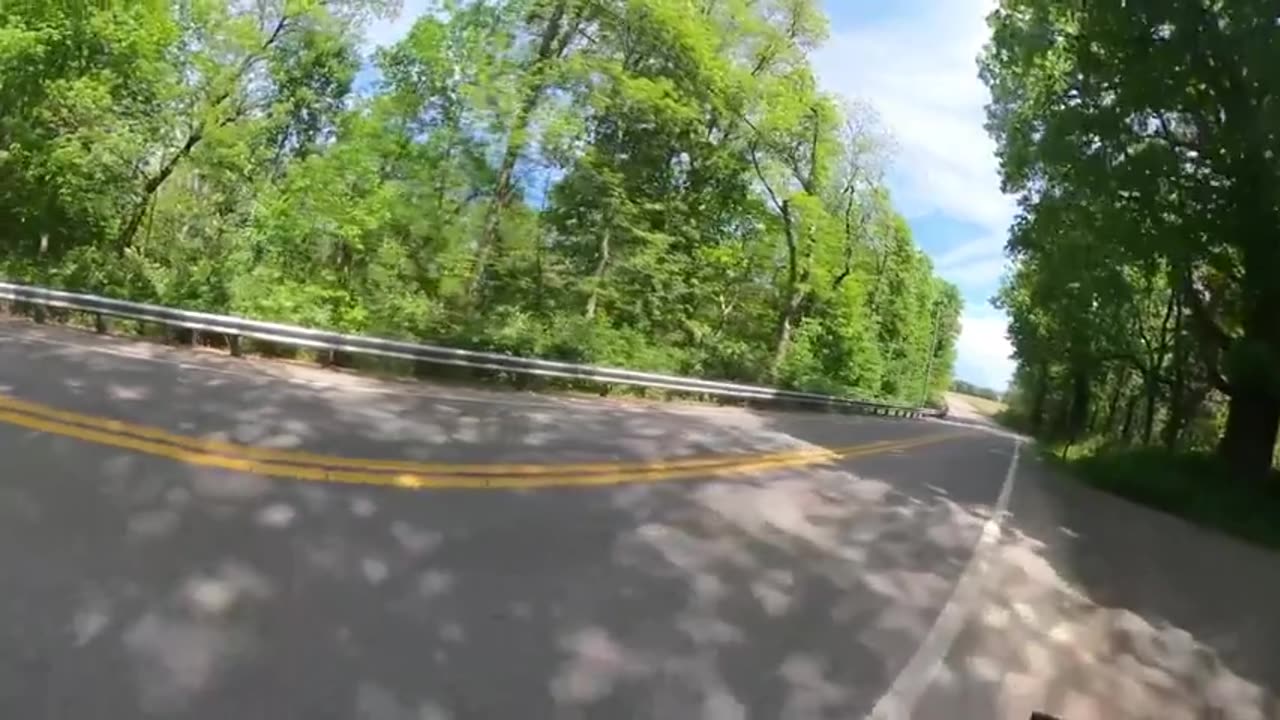 Using a selfie stick while riding a motorbike is a BIG no no