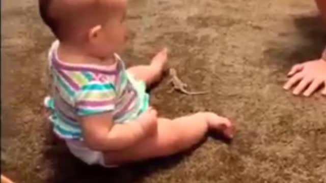 Baby gets scared and cries when he mixes a little animal with a toy.