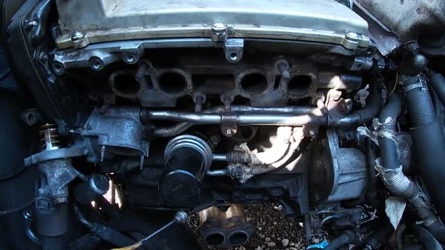 HOW TO INSTALL TOYOTA MR2 EXHAUST MANIFOLD AND THERMOSTAT HOUSING PART 1