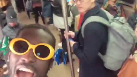 Free meek mill guy with yellow glasses runs out of subway door