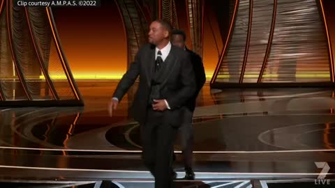 Watch the moment Will Smith smacks Chris Rock on stage at the Oscars