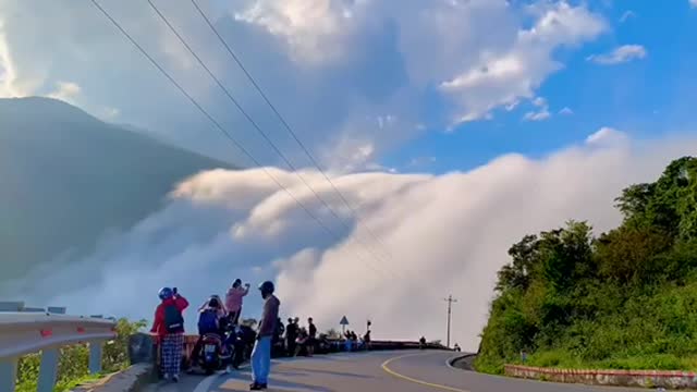 Clouds fall down the beautiful mountains