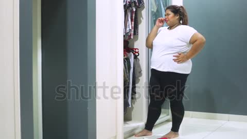 Unhappy overweight woman