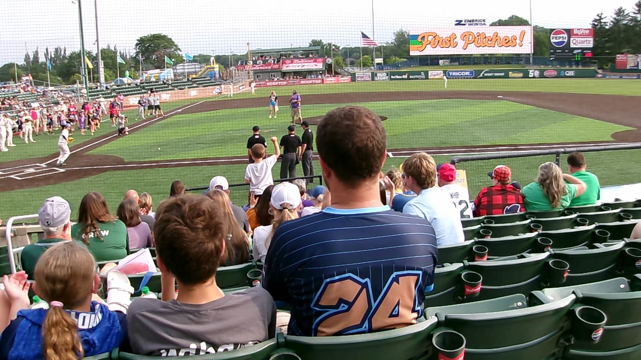 A bunch of kids throw out the first pitch at Madison Mallards game