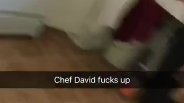 Guy black shirt flipping pancakes loses handle and drops them