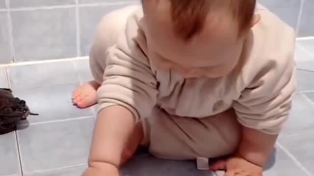 Cute baby and a frog 😍🥰