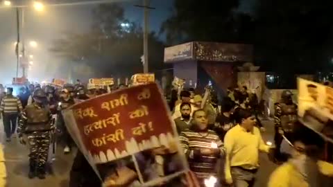 Indians march in streets of Mangolpuri in Delhi demanding justice for Rinku Sharma