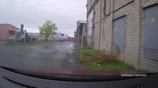 Truck Slides into Wall from Slippery Road