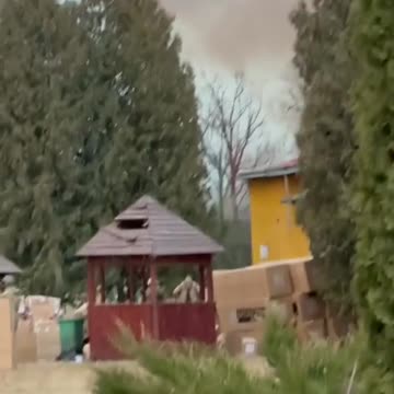 Ukrainan troops outside gymnasium after missle strike