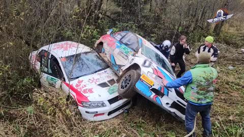 Rally Cars Struggle to Make Turn at Race Track