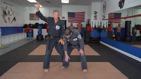 Correcting common errors executing the American Kenpo technique Thundering Hammers