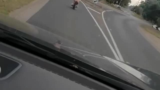 Man Rides Minibike in His Birthday Suit