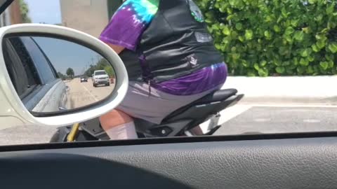 Big Man, Little Bike