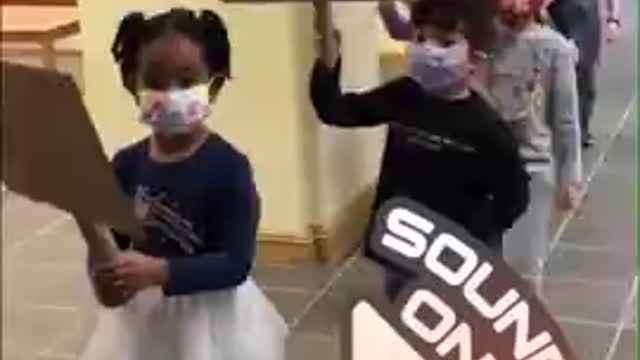 SCHOOL CHILDREN IN DC WALKING AROUND WITH MASKS ON CHANTING "BLACK LIVES MATTER"