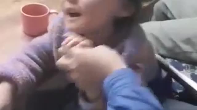 A toddler learning nursery rhymes