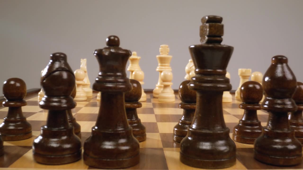 A chessboard surface gliding along the chess pieces