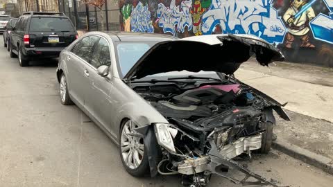 A Wrecked Car on the Street