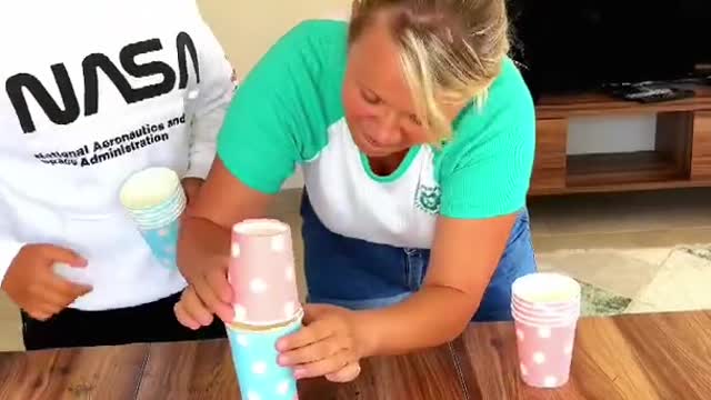 OMG. Her cups fell and she lost 📱