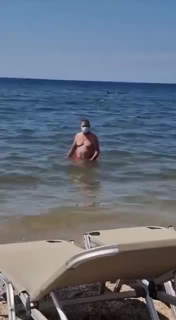 The last covid believer found in the wild, circa 2029, colorized