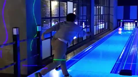 The boy who plays bowling for the first time.