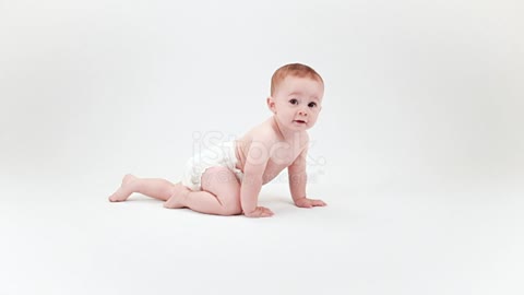 Happy baby learning to craw طفل سعيد يتعلم الزحف