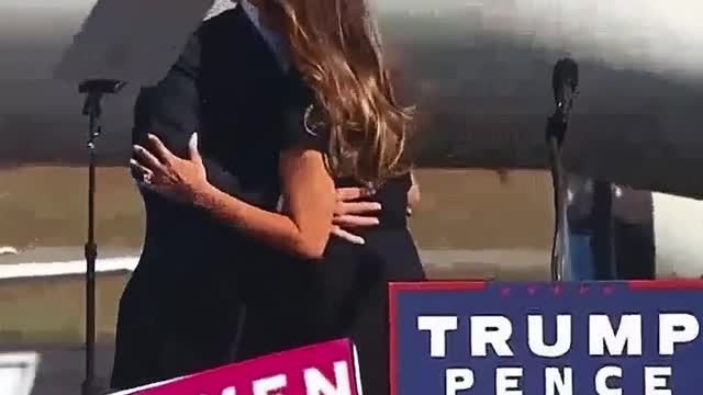 Trump and Melania share a quick kiss