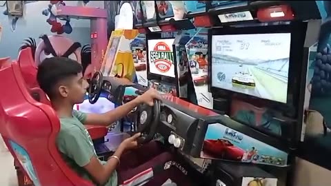 A boy playing car game