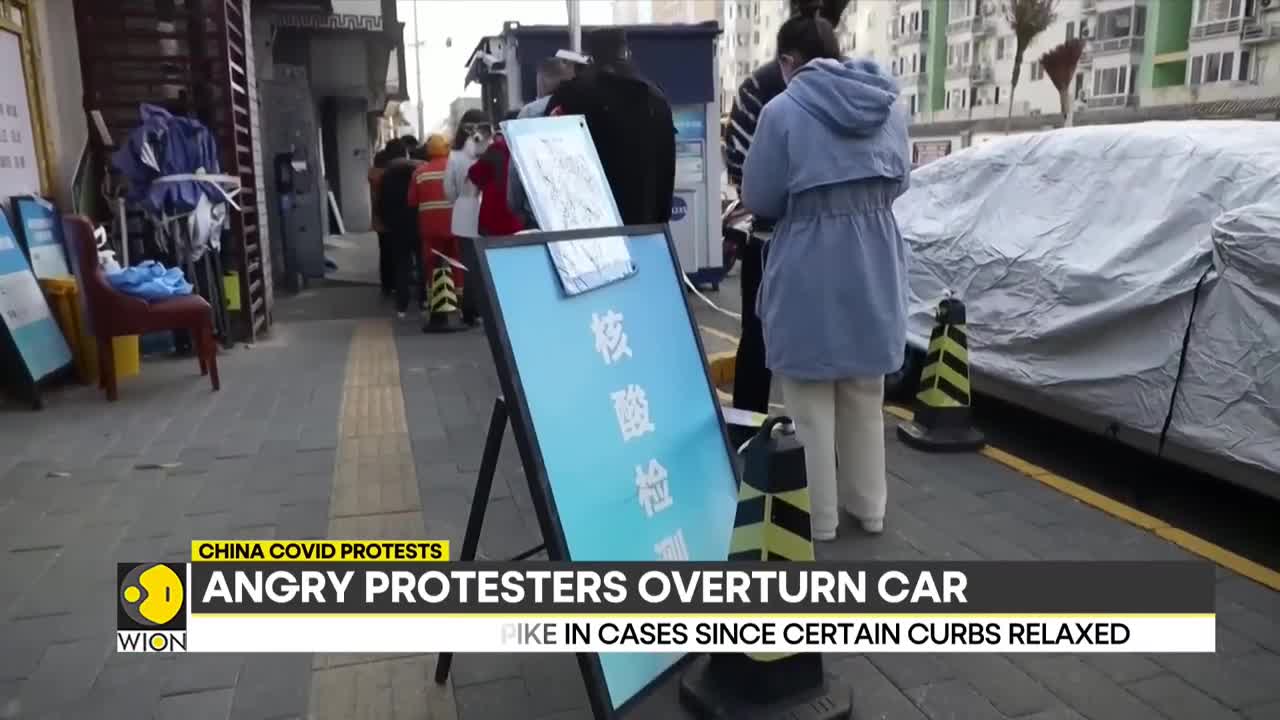 China COVID protests_ People break COVID barriers in Haizhu district _ World English News _ WION