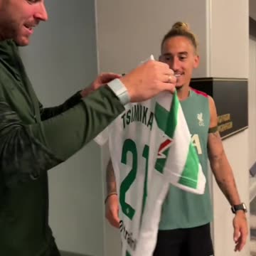 WOW! Tsimikas and Adrian with Real Betis shirt