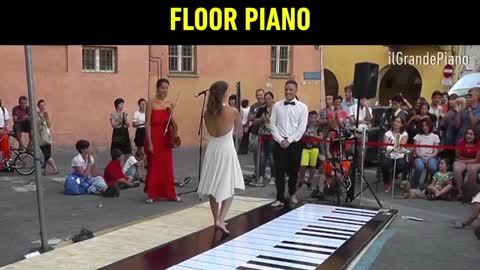 Dancing on a gaint.piano floor