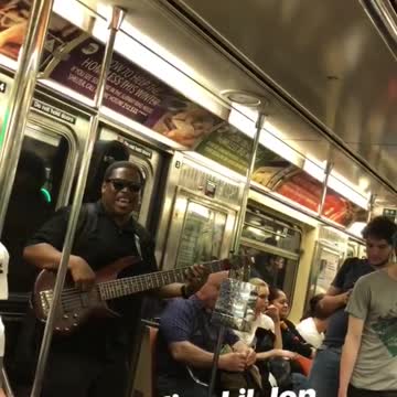 Guy singing lil jon yeah on subway guitar