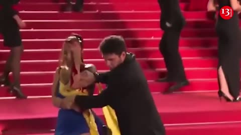 Ukrainian woman was rudely hauled away from red carpet during Cannes Festival