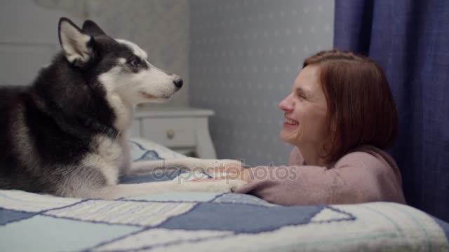 Mother playing with the domestic dog (lovely)