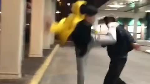 Dumb tough german kid wants to sucker punch guy but gets defeated by gravity