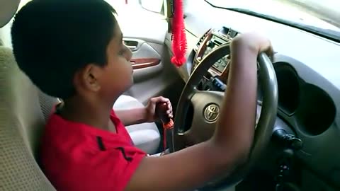 10 years old kid driving a CAB car