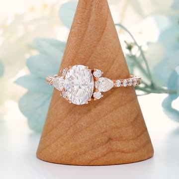 Oval cut moissanite halo engagement ring