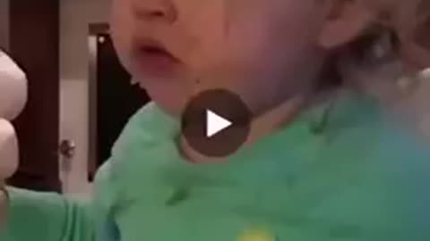 A Beautiful baby trying wasabi