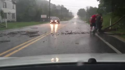 Redneck Cleaning up after bad storm