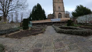 Speedlapse in a garden near a church